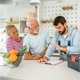 A couple meets with a contractor to discuss home repairs, but know they can use their Return of Premium to offset costs.