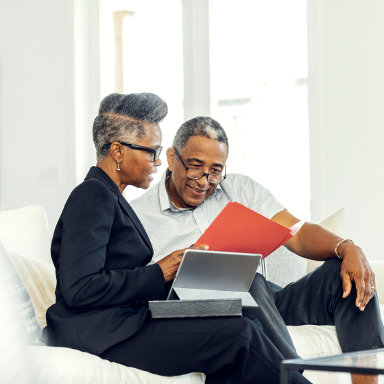 Older couple discussing how Protective® Dimensions V variable annuity can help them reach their retirement goals.