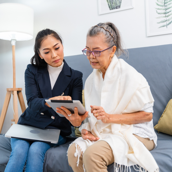 Financial planner showing a client how to secure her retirement goals with SecurePay Income