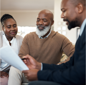 A financial professional conducting a life insurance needs check up with a client.