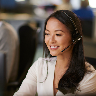 Team member reviewing Protective life insurance policy details with a client over the phone.