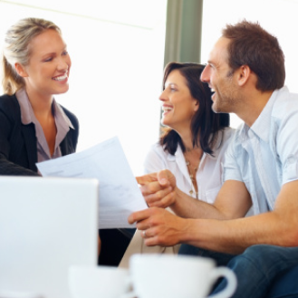  A financial professional sharing life insurance information with her clients.