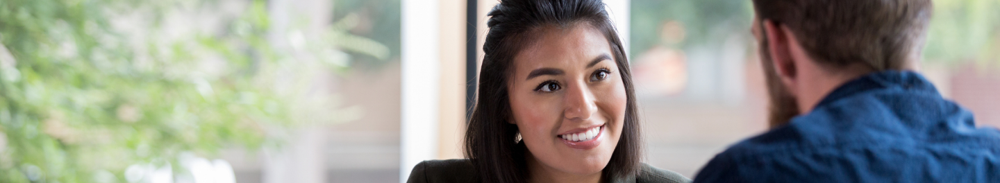 financial professional discussing investment options available for a client's growth plan