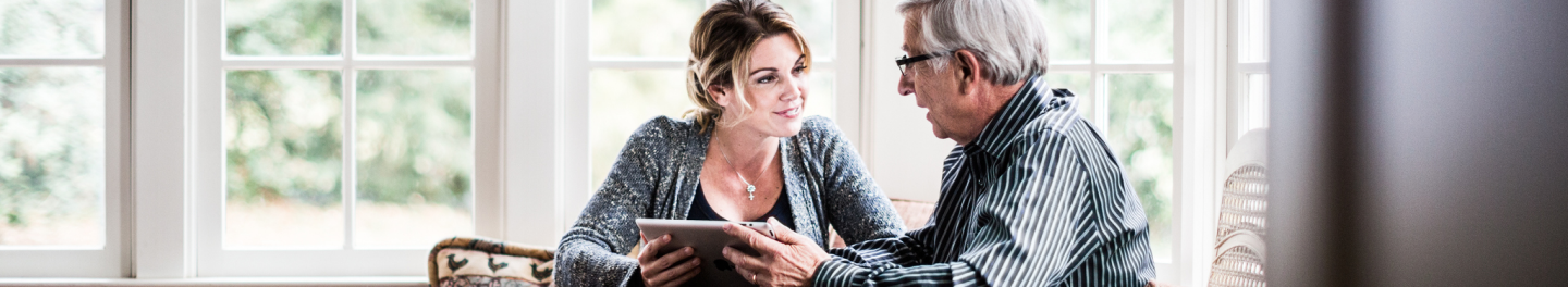 A financial professional talking to a client about Medicare.