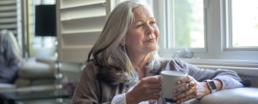 A retirement-aged client looking forward confidently
