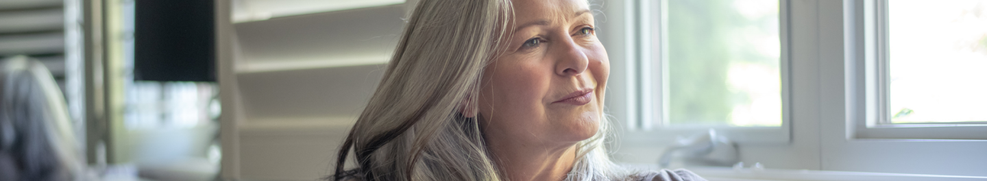 A retirement-aged client looking forward confidently